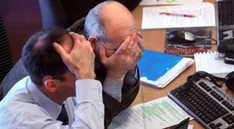 Dow Jones в четверг скатился до 5-летнего минимума. Фото: AFP