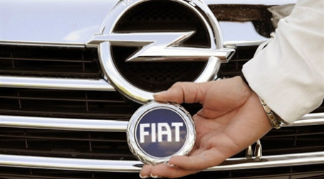 Группа FIAT готовится купить концерн OPEL. Фото: AFP