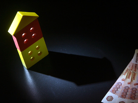 Управляющие компании пока платят лишь НДС со сделок, проведенных с имуществом фонда, а пайщики платят налог на прибыль при выходе из фонда. Фото: Григорий Собченко/BFM.ru