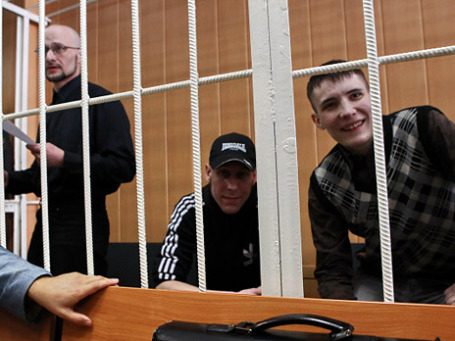 Руслан Хубаев, Игорь Березюк и Кирилл Унчук, обвиняемые по делу о беспорядках на Манежной площади. Фото: РИА Новости