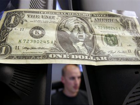 Может ли биткойн заменить доллар? Сейчас — едва ли. Фото: AP