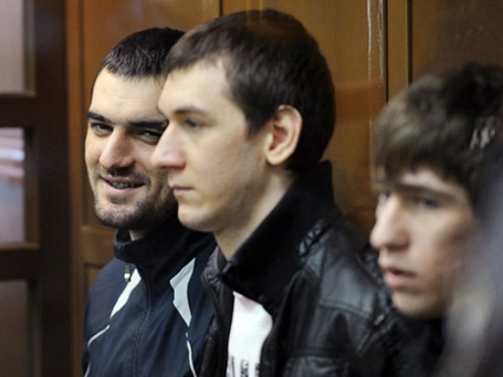 Подсудимые Аслан Черкесов, Акай Акаев, Артур Арсибиев во время судебного заседания по делу об убийстве Егора Свиридова. Фото: РИА Новости