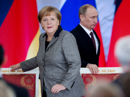 Президент РФ Владимир Путин и канцлер Германии Ангела Меркель во время совместной пресс-конференции по итогам российско-германских межгосударственных консультаций в Большом Кремлевском дворце 16 ноября 2012 г. Фото: РИА Новости
