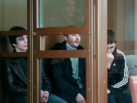 Ахмед Евлоев, Ислам Яндиев и Башир Хамхоев (слева направо), обвиняемые по делу о теракте в аэропорту «Домодедово». Фото: РИА Новости