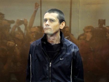 Сергей Помазун, обвиняемый в убийстве шести человек, на заседании Белгородского областного суда. Фото: РИА Новости
