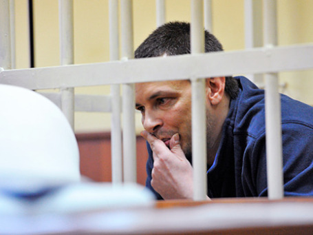 Алексей Кабанов, обвиняемый в убийстве супруги журналистки Ирины, во время предварительных слушаний в Головинском суде Москвы 11 ноября 2013 г. Фото: РИА Новости