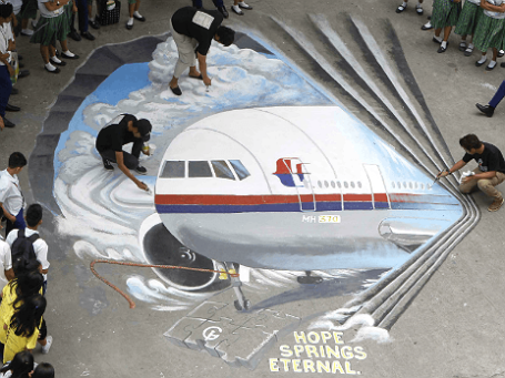 Акция поддержки родственников и близких пропавшего Boeing-777 компании Malaysia Airlines. Фото: Reuters.