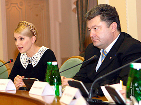 Экс-премьер Украины Юлия Тимошенко и украинский бизнесмен Петр Порошенко. Фото: РИА Новости
