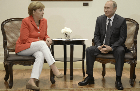 Канцлер Германии Ангела Меркель и президент России Владимир Путин на встрече в Рио-де-Жанейро