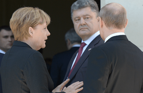 Канцлер Германии Ангела Меркель, президент РФ Владимир Путин и президент Украины Петр Порошенко