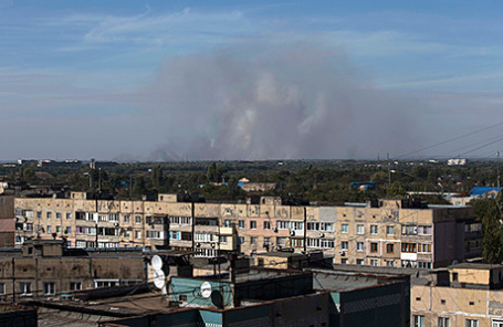 Дым после артобстрела в Донецке, 20 сентября 2014.