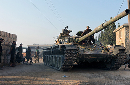 Повстанцы на танке в Алеппо, Сирия.