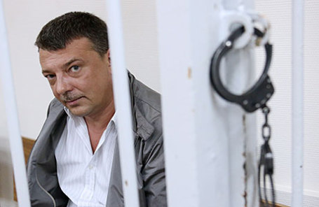 Начальник управления собственной безопасности Следственного комитета России Михаил Максименко, задержанный по подозрению в превышении должностных полномочий и получении взяток.