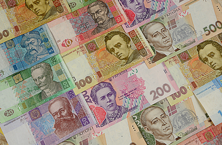 Падение гривны и рубля: две стороны одной монеты