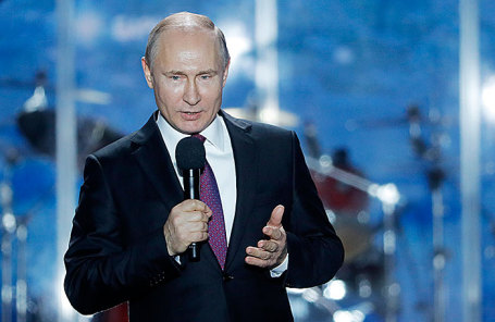 Президент РФ Владимир Путин во время объединенного митинга-концерта «Россия. Севастополь. Крым» на площади Нахимова в Севастополе, 14 марта 2018.