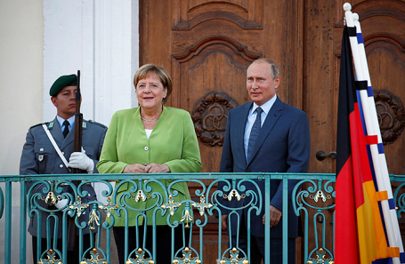Владимир Путин и Ангела Меркель во время встречи в Гранзе, Германия.