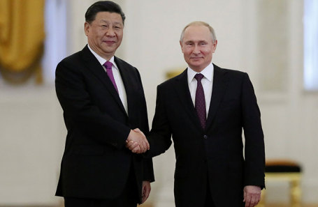 Си Цзиньпин и Владимир Путин во время встречи в Кремле.