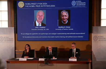 Объявление о присуждении Нобелевской премии по физике в Стокгольме.