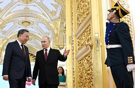То Лам и Владимир Путин.