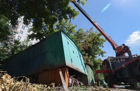 Garage boxes being dismantled