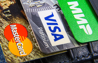 Как скажется на стоимости обслуживания отмена льгот на операции по банковским картам?