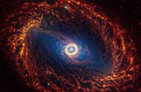 Спиральная галактика NGC 1512, расположенная на расстоянии 30 миллионов световых лет от Земли, видна на изображении, полученном космическим телескопом Джеймса Уэбба.