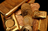 Стоимость золота впервые превысила 5 тысяч долларов за унцию